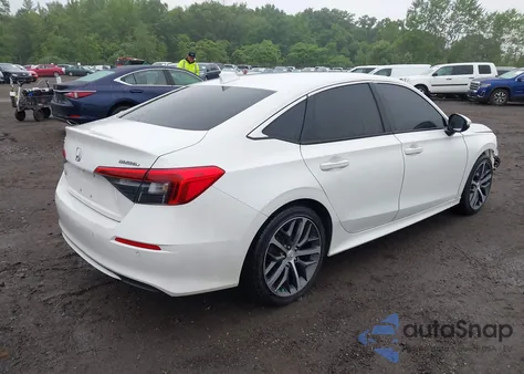 2023 Honda Civic Touring from USA, damaged, VIN 2HGFE1F90PH318196